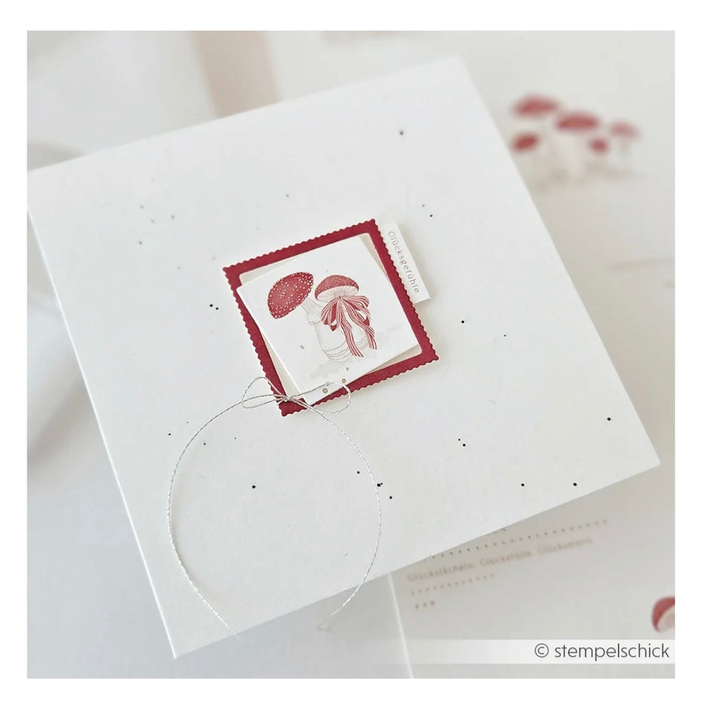 Designpapier 'Glückspilz Szenen mit Typo' 200g/m²